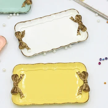 European Creative Resin Plate Lovely Retro Gold Plated Bow-knot Pattern Dessert Fruit Cake Plates Storage Trays Home Decoration
European Creative Resin Plate Lovely Retro Gold Plated Bow-knot Pattern Dessert Fruit Cake Plates Storage Trays Home Decoration