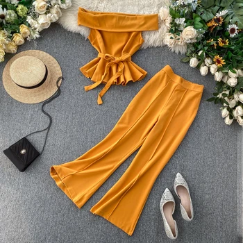 INS Fshion Crop tops With Pants Two piece set Women's 2020 Summer Off-the-shoulder neckline Shirt Tops and Flare pants Suit
INS Fshion Crop tops With Pants Two piece set Women's 2020 Summer Off-the-shoulder neckline Shirt Tops and Flare pants Suit