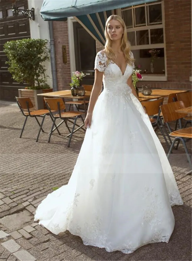 Fabulous Lace Appliques A-Line Wedding Dress Short Sleeves Handmade Flowers Adorned Waist Bridal Dress Custom Made V Back
Fabulous Lace Appliques A-Line Wedding Dress Short Sleeves Handmade Flowers Adorned Waist Bridal Dress Custom Made V Back