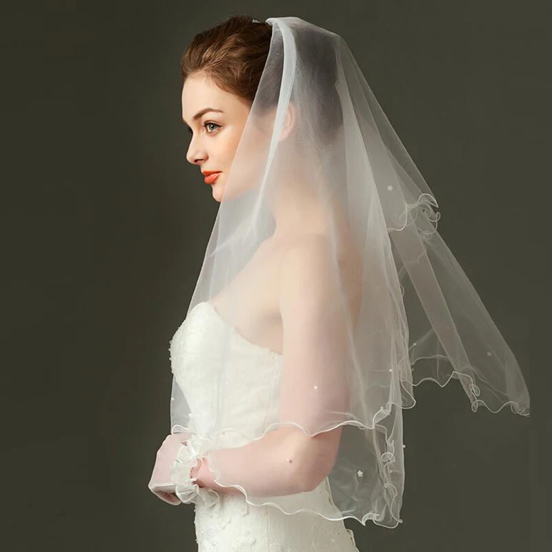 High Fashion White Tulle One Tier Pearls Edge Bridal Wedding Veils 120cm Elbow Length Bride Veils On Sale Wedding Accessory
High Fashion White Tulle One Tier Pearls Edge Bridal Wedding Veils 120cm Elbow Length Bride Veils On Sale Wedding Accessory