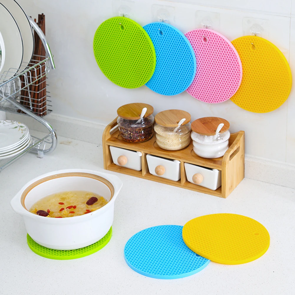 18cm Multi-use Round Silicone Non-slip Heat Resistant Mat Hang Tableware Coaster Cushion Placemat Pot Holder Kitchen Accessories
18cm Multi-use Round Silicone Non-slip Heat Resistant Mat Hang Tableware Coaster Cushion Placemat Pot Holder Kitchen Accessories