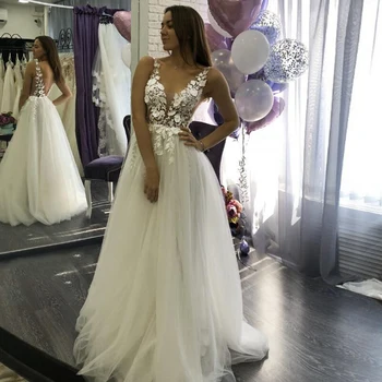 Boho Wedding Dresses 2020 V-Neck Sleeveless Appliques Lace A-Line Beach Wedding Gown Vestidos De Novia Open Back Custom Made
Boho Wedding Dresses 2020 V-Neck Sleeveless Appliques Lace A-Line Beach Wedding Gown Vestidos De Novia Open Back Custom Made