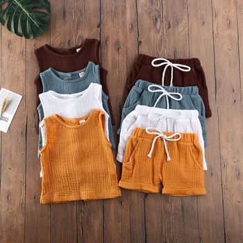 Summer Infant Kids Baby Girl Clothes Sets Solid Color Sleeveless Tops Short Pants Button Outfit Girls Boys Clothing Set
Summer Infant Kids Baby Girl Clothes Sets Solid Color Sleeveless Tops Short Pants Button Outfit Girls Boys Clothing Set