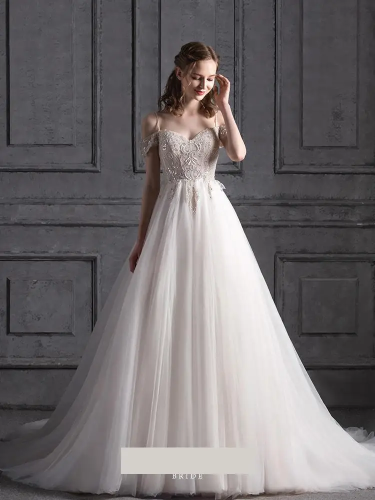 White Tulle Wedding Dress Spaghetti Strapless Sweetheart Wedding Gowns For Bride A Line Embroidery Beaded Robe De Mariee Boheme
White Tulle Wedding Dress Spaghetti Strapless Sweetheart Wedding Gowns For Bride A Line Embroidery Beaded Robe De Mariee Boheme