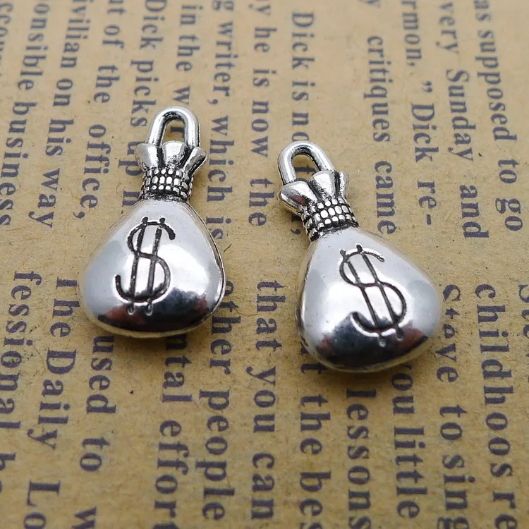 10 pieces/lot 10*17mm Antique silver color Metal alloy dollar sign A bag of money charm Necklace Pendant Bracelet Key chain DIY
10 pieces/lot 10*17mm Antique silver color Metal alloy dollar sign A bag of money charm Necklace Pendant Bracelet Key chain DIY
