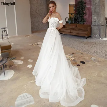 Thinyfull Elegant Off The Shoulder Wedding Dresses Beach Lace Appliques Illusion Boho Princess Wedding Party Gowns Vestido Novia
Thinyfull Elegant Off The Shoulder Wedding Dresses Beach Lace Appliques Illusion Boho Princess Wedding Party Gowns Vestido Novia