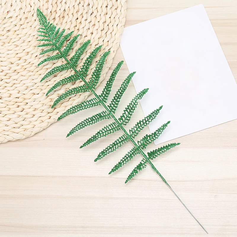 40Cm*14Cm Hollow Shuttle Shape Leaves Christmas Tree Decorative Glitter Leaves Home Artificial Plastic Flower New Year Decor
40Cm*14Cm Hollow Shuttle Shape Leaves Christmas Tree Decorative Glitter Leaves Home Artificial Plastic Flower New Year Decor