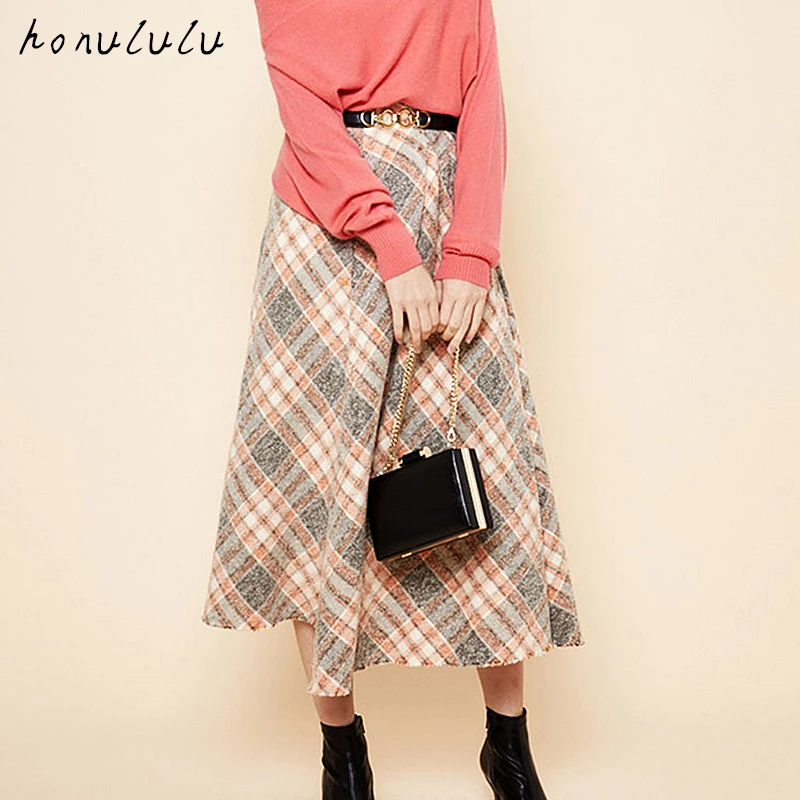 Autumn new style Japanese women's retro irregular check wool woolen A-line skirt
Autumn new style Japanese women's retro irregular check wool woolen A-line skirt