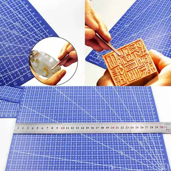 A3 Cutting Mat Plastic Cutting Mat Rectangular Grid Line Cutting Pad Tool 45 cm * 30 cm
A3 Cutting Mat Plastic Cutting Mat Rectangular Grid Line Cutting Pad Tool 45 cm * 30 cm