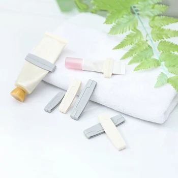 Bathroom Toothpaste Dispenser Cream Tube Face Wash Squeezer Easy Squeeze Paste Dispenser Roll Stand 
Bathroom Toothpaste Dispenser Cream Tube Face Wash Squeezer Easy Squeeze Paste Dispenser Roll Stand