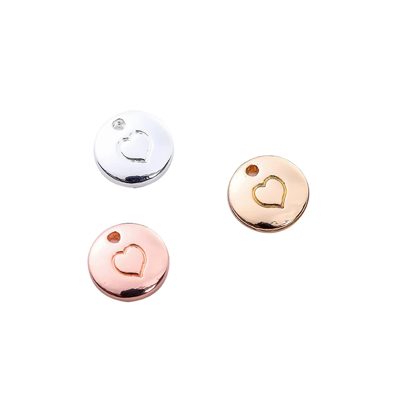 A package of gold round carved heart-shaped alloy accessories jewelry accessories DIY suitable for necklace making accessories 
A package of gold round carved heart-shaped alloy accessories jewelry accessories DIY suitable for necklace making accessories