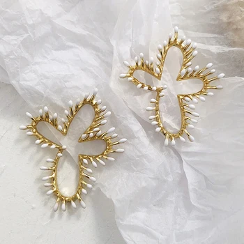 AENSOA 2020 Unique Design Irregular Metal Flowers Dangle Earrings Korean High Fashion Exaggerated Cross Alloy Earring For Women
AENSOA 2020 Unique Design Irregular Metal Flowers Dangle Earrings Korean High Fashion Exaggerated Cross Alloy Earring For Women