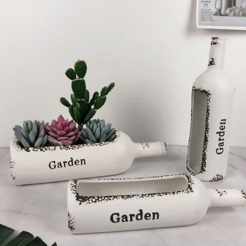 Ceramic Wine Bottle Flower Pot Storage Succulent Plants Container Crafts Hand Drawn Alphabet Desktop Decoration Retro Vase
Ceramic Wine Bottle Flower Pot Storage Succulent Plants Container Crafts Hand Drawn Alphabet Desktop Decoration Retro Vase