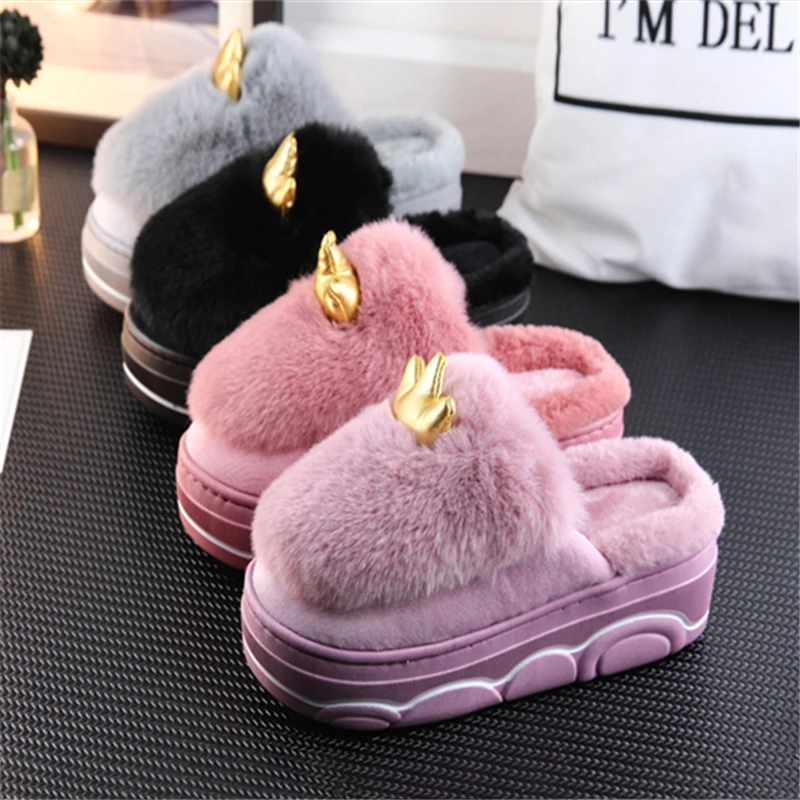 purple fluffy slippers