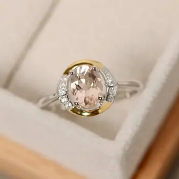 New European and American fashion ring female inlaid S925 silver color separation champagne ring oval Morganite gemstone ring
New European and American fashion ring female inlaid S925 silver color separation champagne ring oval Morganite gemstone ring