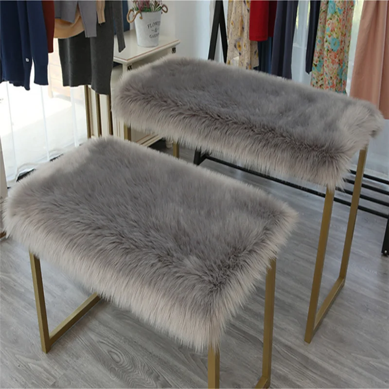Articles placed long plush artificial fur, table top covered with fluffy blanket, rectangular fluffy cushion
Articles placed long plush artificial fur, table top covered with fluffy blanket, rectangular fluffy cushion