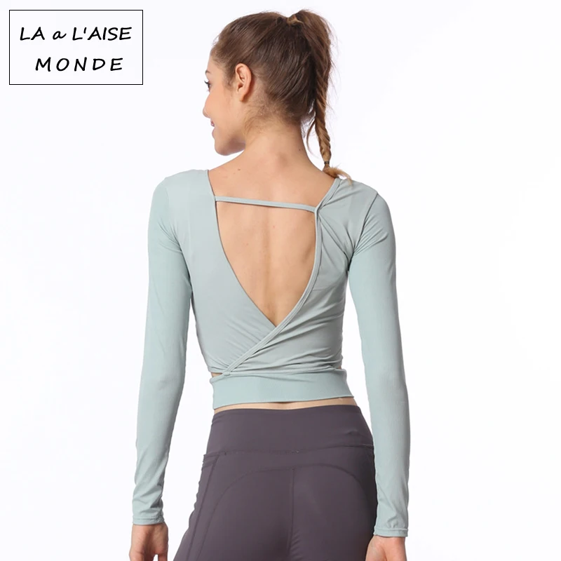 Women Backless Yoga Shirts Breathable Workout Yoga Top Sport Gym Running Fitness Crop Top Vest Activewear Sportwear Solid Color
Women Backless Yoga Shirts Breathable Workout Yoga Top Sport Gym Running Fitness Crop Top Vest Activewear Sportwear Solid Color