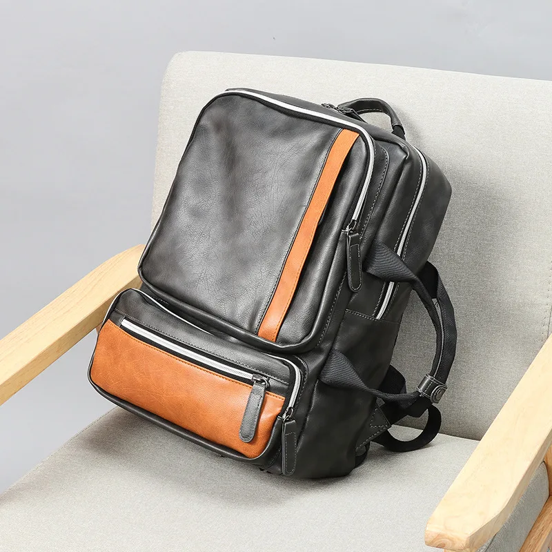 2020 hot style retro backpack pu leather computer bag college student school bag hit color stitching men's backpack
2020 hot style retro backpack pu leather computer bag college student school bag hit color stitching men's backpack