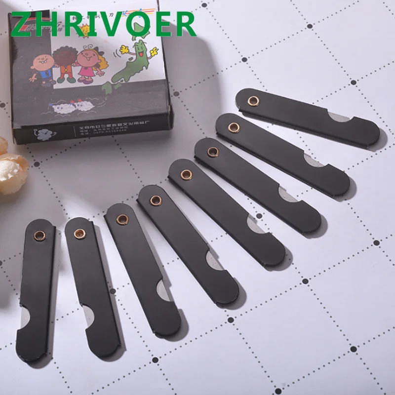 DIY stationery safety paper knife black and white iron peel pencil sharpener small steel knife student art knife
DIY stationery safety paper knife black and white iron peel pencil sharpener small steel knife student art knife