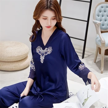 Pajamas set solid color sexy lace net red explosion models spring and summer new silky ladies nightgown V-neck home service
Pajamas set solid color sexy lace net red explosion models spring and summer new silky ladies nightgown V-neck home service