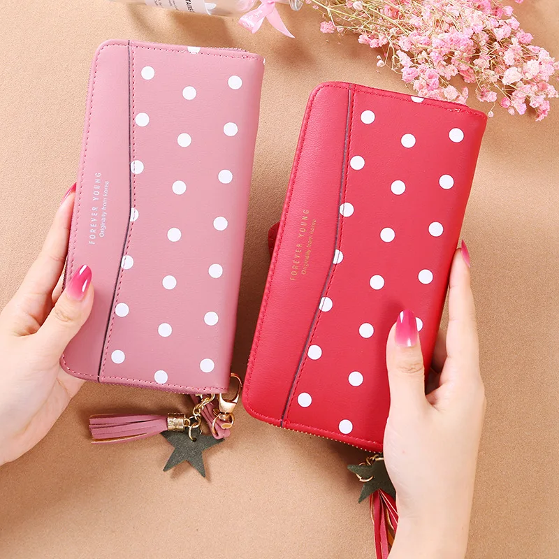 2020 new ladies wallet Korean version cute polka dot long clutch multifunctional zipper tassel mobile phone bag
2020 new ladies wallet Korean version cute polka dot long clutch multifunctional zipper tassel mobile phone bag