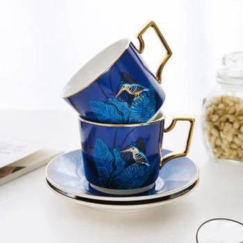 European Creative Coffe cups Ceramic Tea set Breakfast Fruit juice Milk Mugs Golden handle Tea cup saucer set Kitchen Drinkware
European Creative Coffe cups Ceramic Tea set Breakfast Fruit juice Milk Mugs Golden handle Tea cup saucer set Kitchen Drinkware