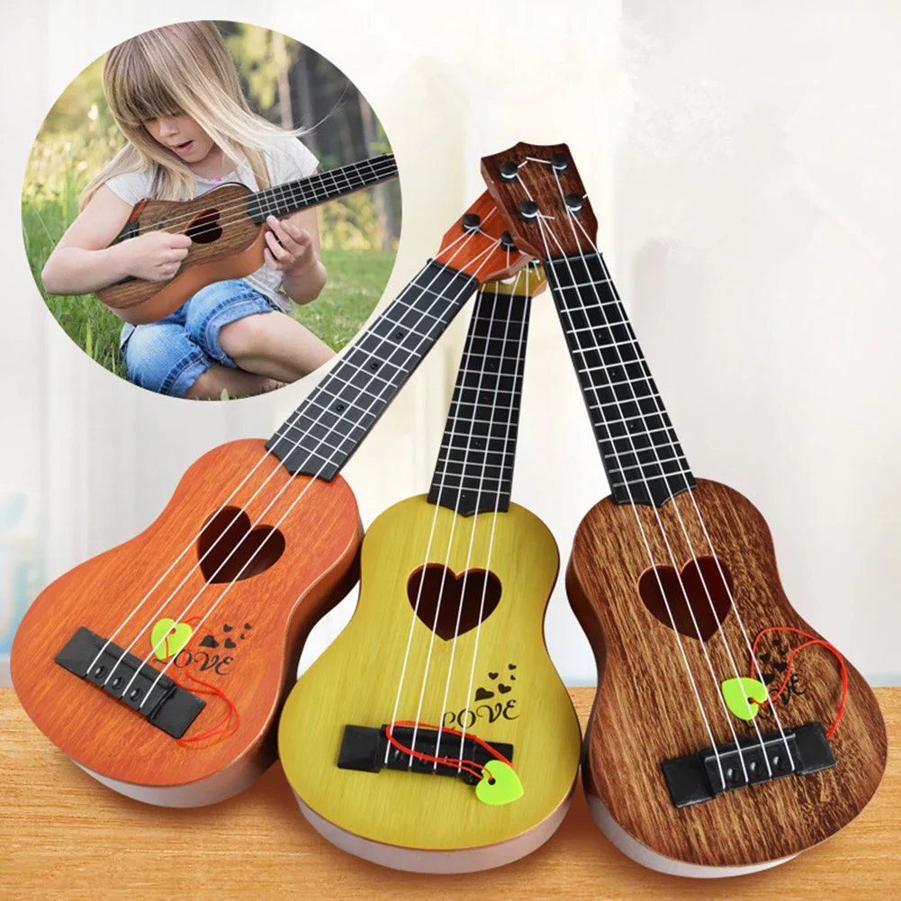 Early Childhood Music Toy Childrens Ukulele Guitar Plastic Toy Simulation 4 String Musical Instruments Learning Education Tool
Early Childhood Music Toy Childrens Ukulele Guitar Plastic Toy Simulation 4 String Musical Instruments Learning Education Tool