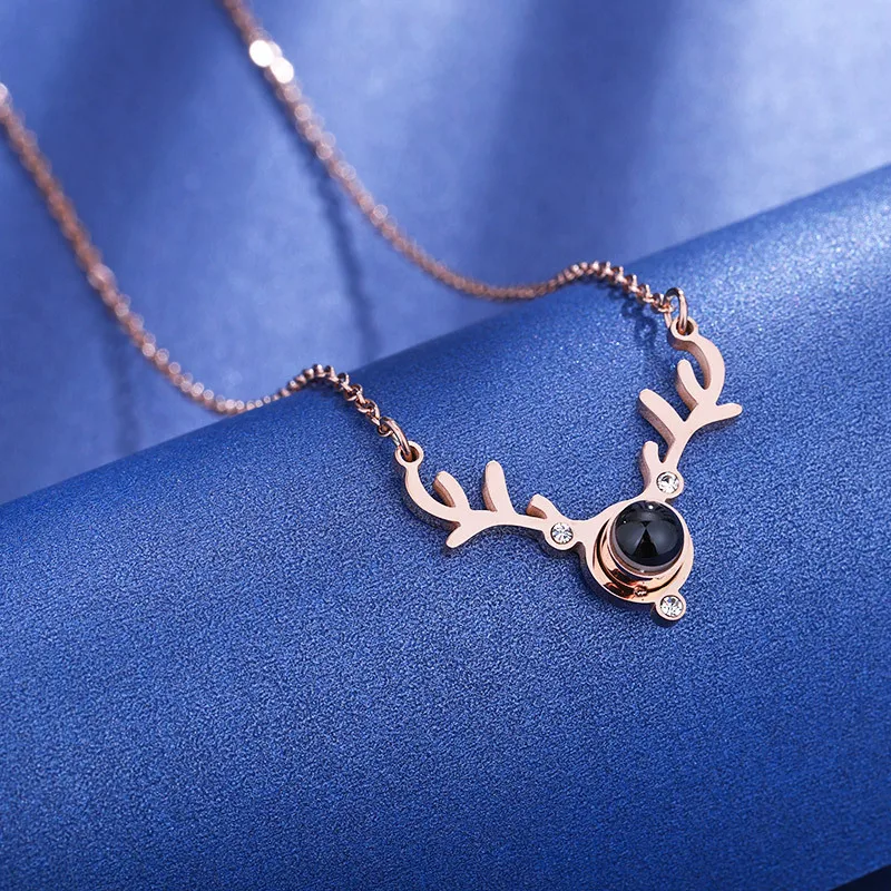 ZooMango Romantic 100 Languages I Love You Charm Necklaces For Women Stainless Steel Crystal Antler Pendant Necklace RN02163 
ZooMango Romantic 100 Languages I Love You Charm Necklaces For Women Stainless Steel Crystal Antler Pendant Necklace RN02163