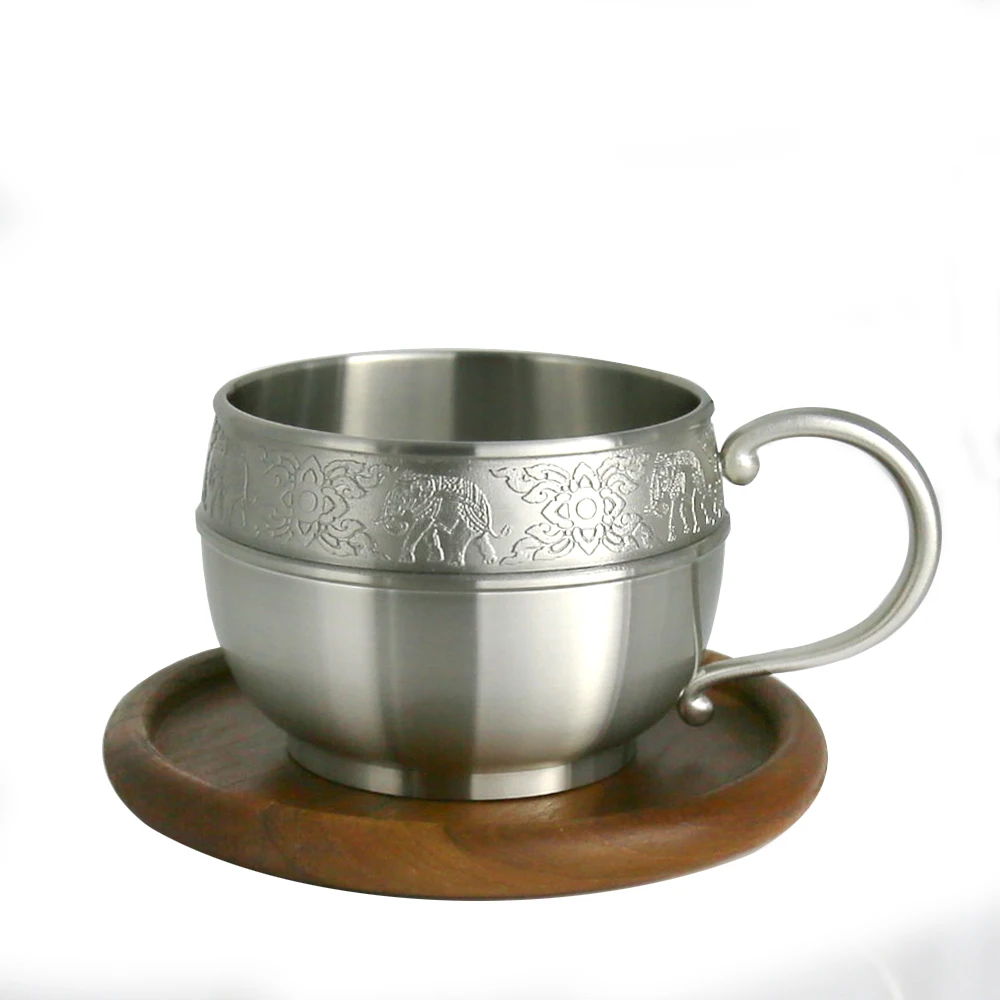 Oriental Pewter - Pewter Coffee Cup w/ Wooden Saucer Hand Carved Beautiful Embossed CCW Pure Tin 97% Lead-Free Made in Thailand
Oriental Pewter - Pewter Coffee Cup w/ Wooden Saucer Hand Carved Beautiful Embossed CCW Pure Tin 97% Lead-Free Made in Thailand