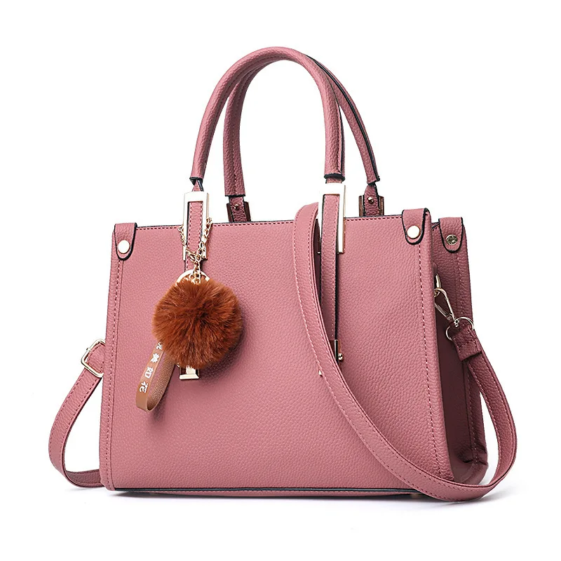 

Simple and fashionable female bag 2021 new mother bag large capacity handbag hair ball pendant shoulder messenger bag