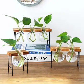 Creative Glass Bottle Vase Hydroponic Plant Transparent Vase Wooden Frame Coffee Shop Room Decor Table Desk Decoration Vase
Creative Glass Bottle Vase Hydroponic Plant Transparent Vase Wooden Frame Coffee Shop Room Decor Table Desk Decoration Vase