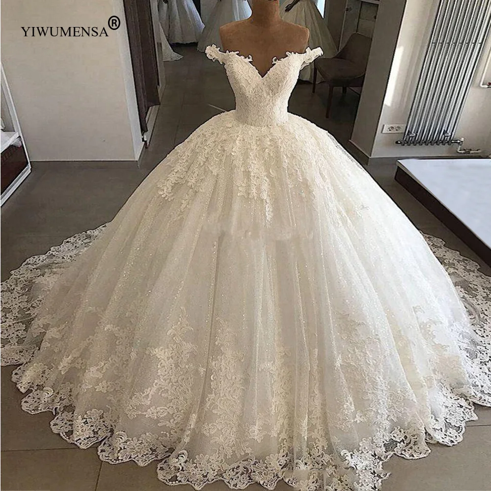 Luxury Sparkly Tulle Wedding Dresses V Neck Off Shoulder Princess Ball Gown Bridal Ivory Appliques Beaded Lace-Up Women Clothing
Luxury Sparkly Tulle Wedding Dresses V Neck Off Shoulder Princess Ball Gown Bridal Ivory Appliques Beaded Lace-Up Women Clothing