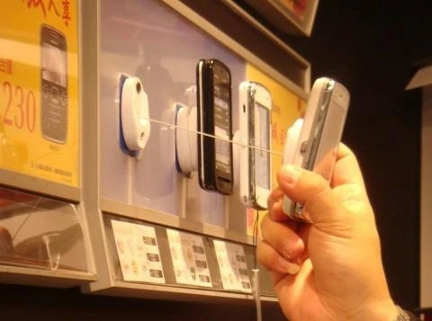 Retractable_Device_for_Cellular_Phone_Retai_lDisplay_anti_shoplifting_retracting_cable