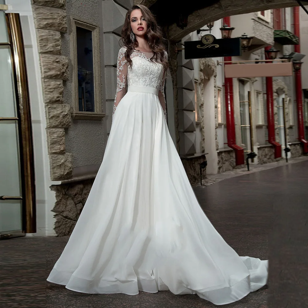 2020 Long Sleeves Wedding Dress Plus Size Scoop Neck Applique Backless Chiffon Summer Bridal Gown Vestido De Novia
2020 Long Sleeves Wedding Dress Plus Size Scoop Neck Applique Backless Chiffon Summer Bridal Gown Vestido De Novia