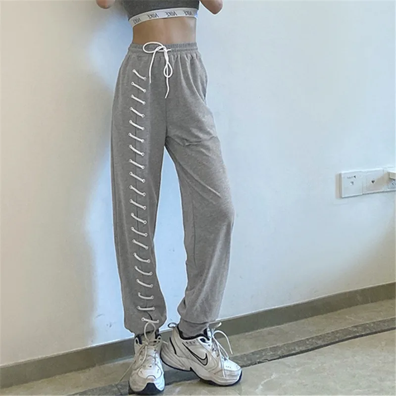 NCLAGEN Personality Drawstring Women Loose Casual Sweatpants Streetwear High Waist Hole Joggers Pants Mujer Sudadera Trousers
NCLAGEN Personality Drawstring Women Loose Casual Sweatpants Streetwear High Waist Hole Joggers Pants Mujer Sudadera Trousers