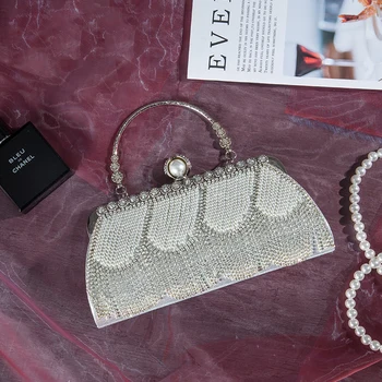 Women Fashion Evening Handbag Pearl String Tassle Diamond Studded Hasp Frame Lady Clutch Purse Elegant Crossbody Shoulder Bag 
Women Fashion Evening Handbag Pearl String Tassle Diamond Studded Hasp Frame Lady Clutch Purse Elegant Crossbody Shoulder Bag