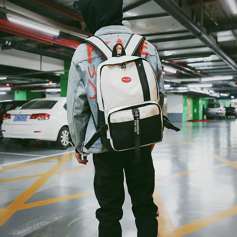 The new college style pure color letter sticker lover model male and female tide double shoulder backpack student bag
The new college style pure color letter sticker lover model male and female tide double shoulder backpack student bag