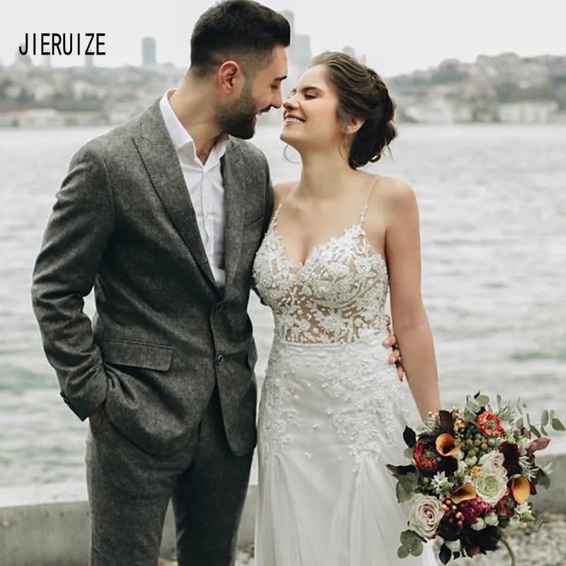JIERUIZE 2020 Spaghetti Straps Illusion Beach Wedding Dresses Bridal Gowns Custom Backless Made Robe De Mariee 
JIERUIZE 2020 Spaghetti Straps Illusion Beach Wedding Dresses Bridal Gowns Custom Backless Made Robe De Mariee