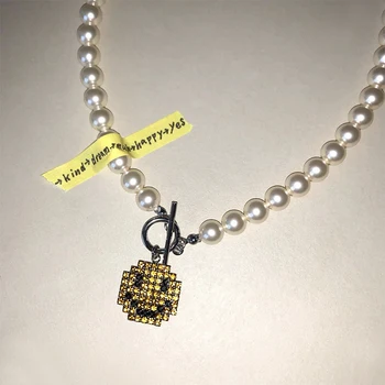 Simple personality design crystal smiling face pearl OT buckle short necklace chock chain girl necklace
Simple personality design crystal smiling face pearl OT buckle short necklace chock chain girl necklace
