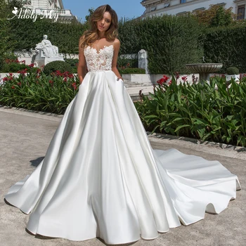 Adoly Mey New Arrival Scoop Neck Backless A-Line Wedding Dresses 2020 Luxury Appliques Beaded Chapel Train Princess Bride Gown
Adoly Mey New Arrival Scoop Neck Backless A-Line Wedding Dresses 2020 Luxury Appliques Beaded Chapel Train Princess Bride Gown