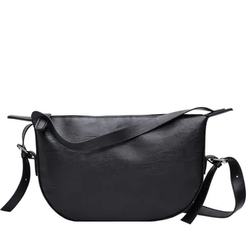 The new Hong Kong style crossbody bag female wild solid color saddle bag simple foreign style shoulder small bag trend 
The new Hong Kong style crossbody bag female wild solid color saddle bag simple foreign style shoulder small bag trend
