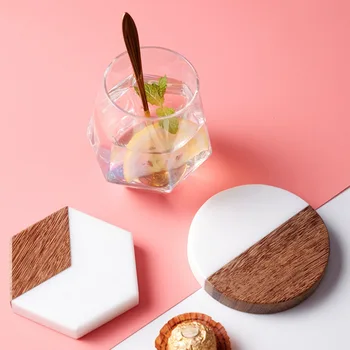 10 cm Creative thickening marble Mosaic solid wood insulation non-slip coasters round hexagonal coasters
10 cm Creative thickening marble Mosaic solid wood insulation non-slip coasters round hexagonal coasters