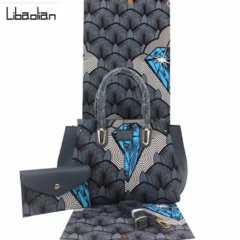New Fashion arrival real soft 100%cotton new wax fabric with woman's handbag set.african ankara wax bag for african dress F12-25
New Fashion arrival real soft 100%cotton new wax fabric with woman's handbag set.african ankara wax bag for african dress F12-25