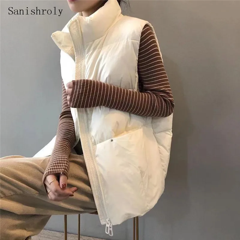 Autumn Winter Women Ultra Light White Duck Down Vest Casual Stand Collar Sleeveless Loose Waistcoat Jakcet Female Down Coat Tops
Autumn Winter Women Ultra Light White Duck Down Vest Casual Stand Collar Sleeveless Loose Waistcoat Jakcet Female Down Coat Tops