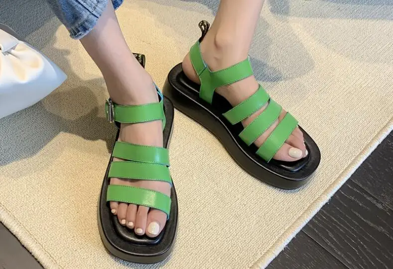 Dipsloot Hot Girls White Black Green Soft Leather Rome Casual Flat Sandals Woman Thick Sole Buckle Strap Leisure Sandals Flats
Dipsloot Hot Girls White Black Green Soft Leather Rome Casual Flat Sandals Woman Thick Sole Buckle Strap Leisure Sandals Flats