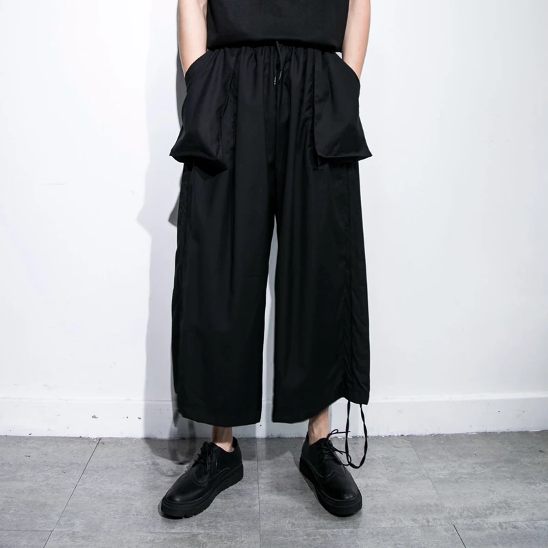 Men's new classic dark fashion brand Yamamoto style personality large pocket side drawstring design loose size nine point pants
Men's new classic dark fashion brand Yamamoto style personality large pocket side drawstring design loose size nine point pants