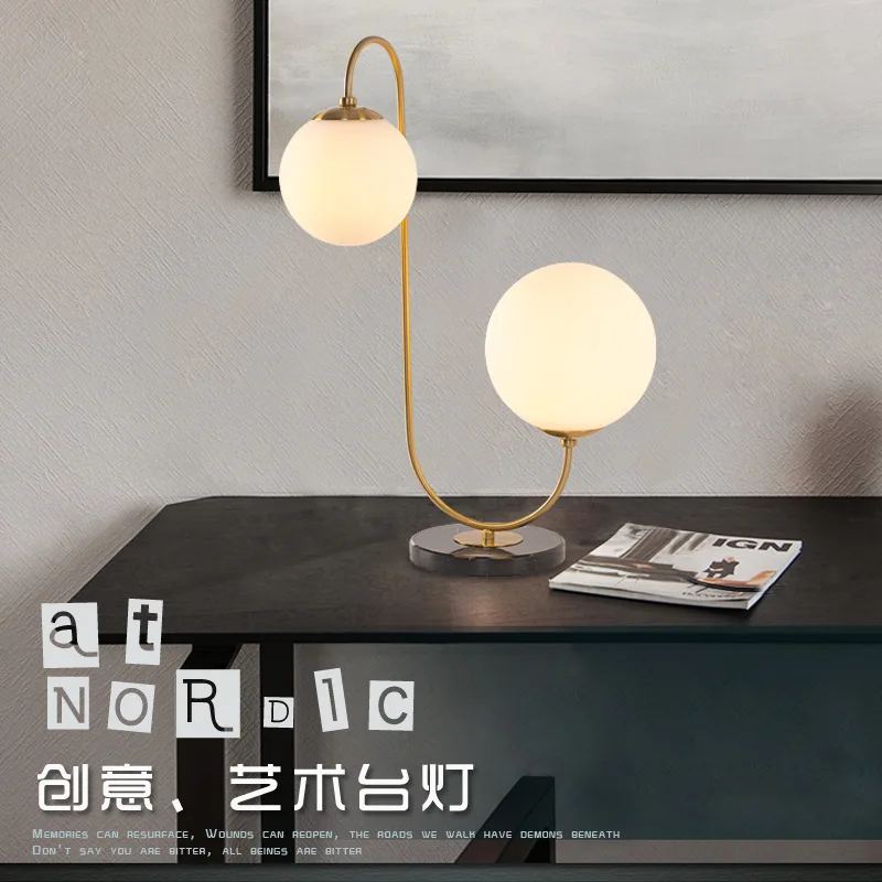 Postmodern glass lamp Nordic contracted personality decoration ball desk lamp of bedroom the head of a bed
Postmodern glass lamp Nordic contracted personality decoration ball desk lamp of bedroom the head of a bed