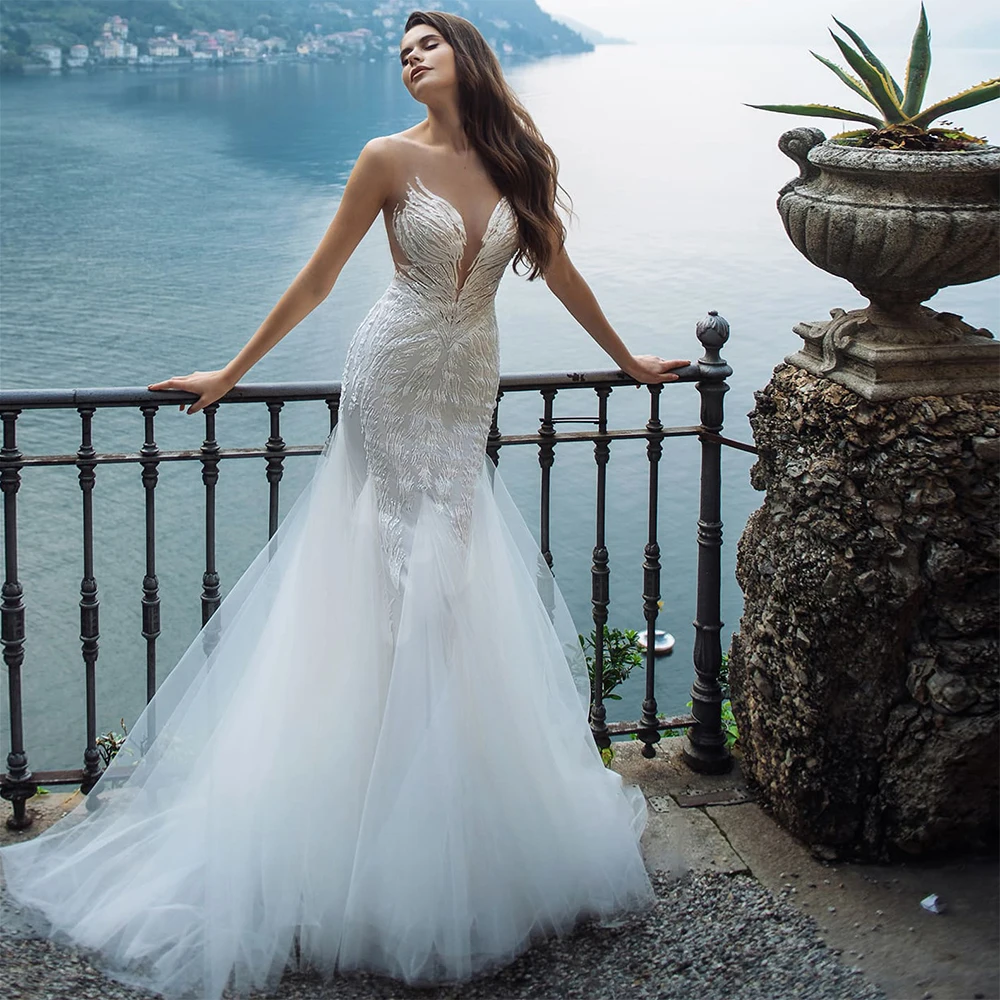 Sexy Mermaid Weddding Dresses Illusion O Neck Off Shoulder Fashion Appliqued Button Floor Length 2020 Bridal Gowns
Sexy Mermaid Weddding Dresses Illusion O Neck Off Shoulder Fashion Appliqued Button Floor Length 2020 Bridal Gowns