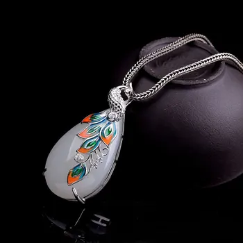 Character silver product new version droplets inlay lip prints warm and elegant craft peacock bluing S925 pendant
Character silver product new version droplets inlay lip prints warm and elegant craft peacock bluing S925 pendant