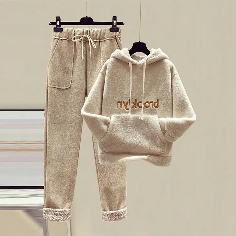 Autumn and winter fashion suit female students loose plus velvet padded sweater cropped wool casual pants
Autumn and winter fashion suit female students loose plus velvet padded sweater cropped wool casual pants